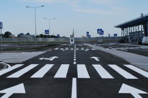 Горизонтальная дорожная разметка - фото